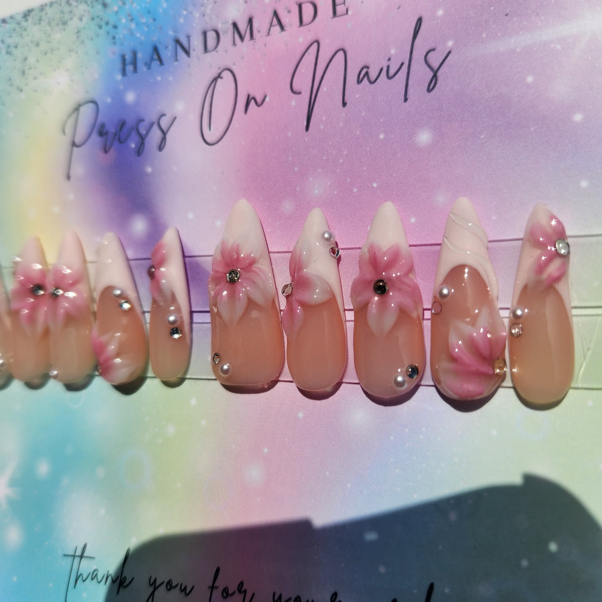 long stiletto almond shape light pink French tip pink 3d floral rhinestone press ons