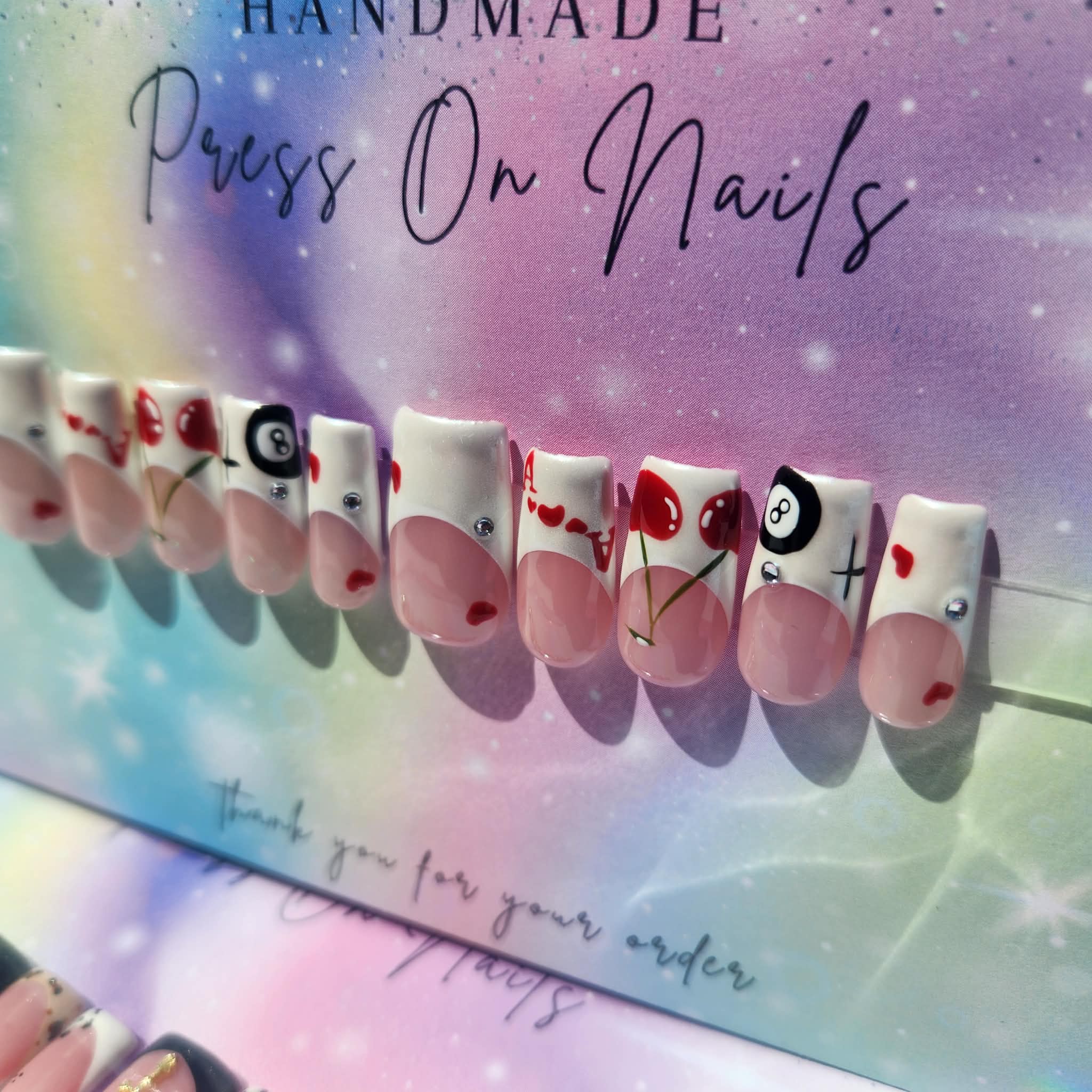 Shimmer white French tip heart A cherry 8ball press ons