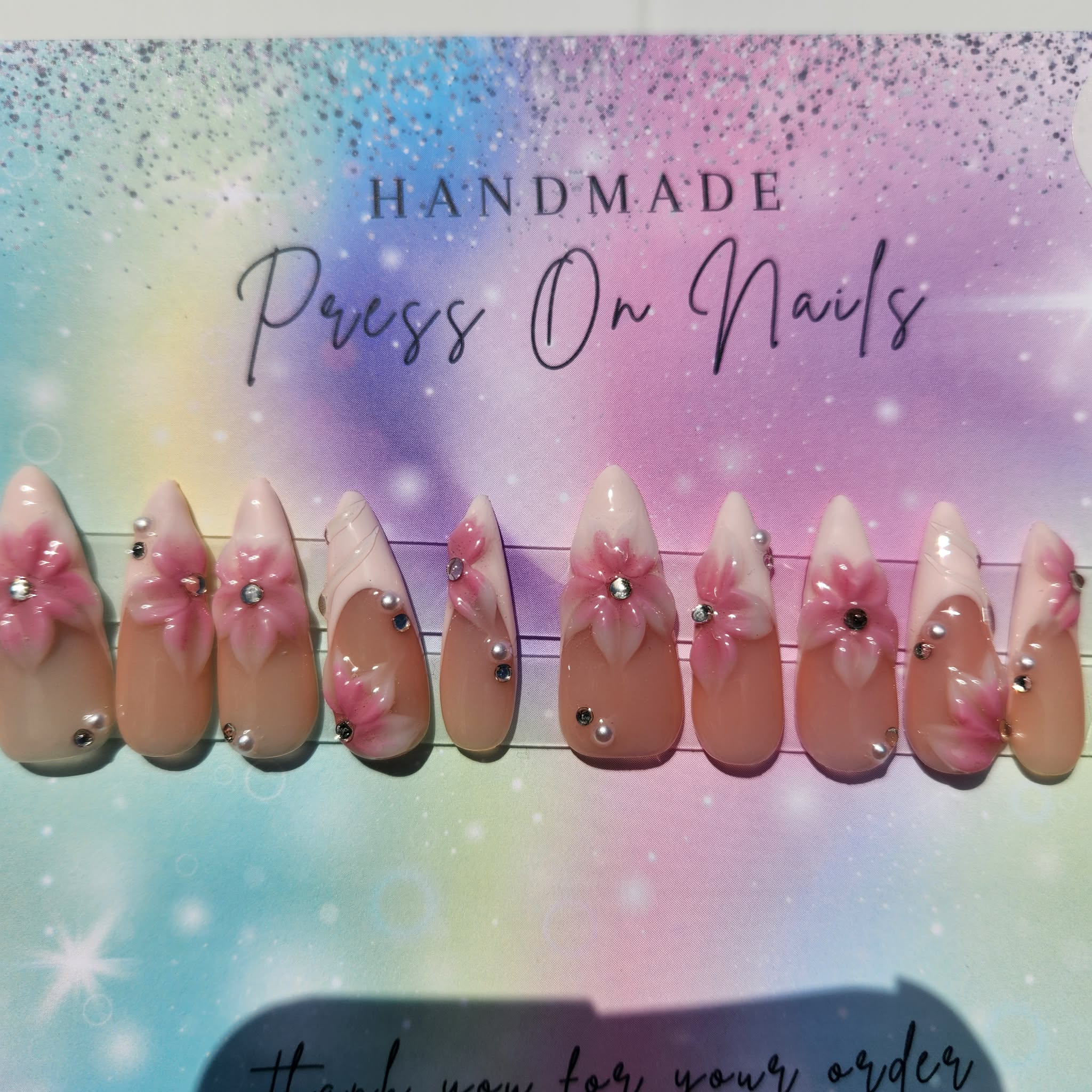 long stiletto almond shape light pink French tip pink 3d floral rhinestone press ons