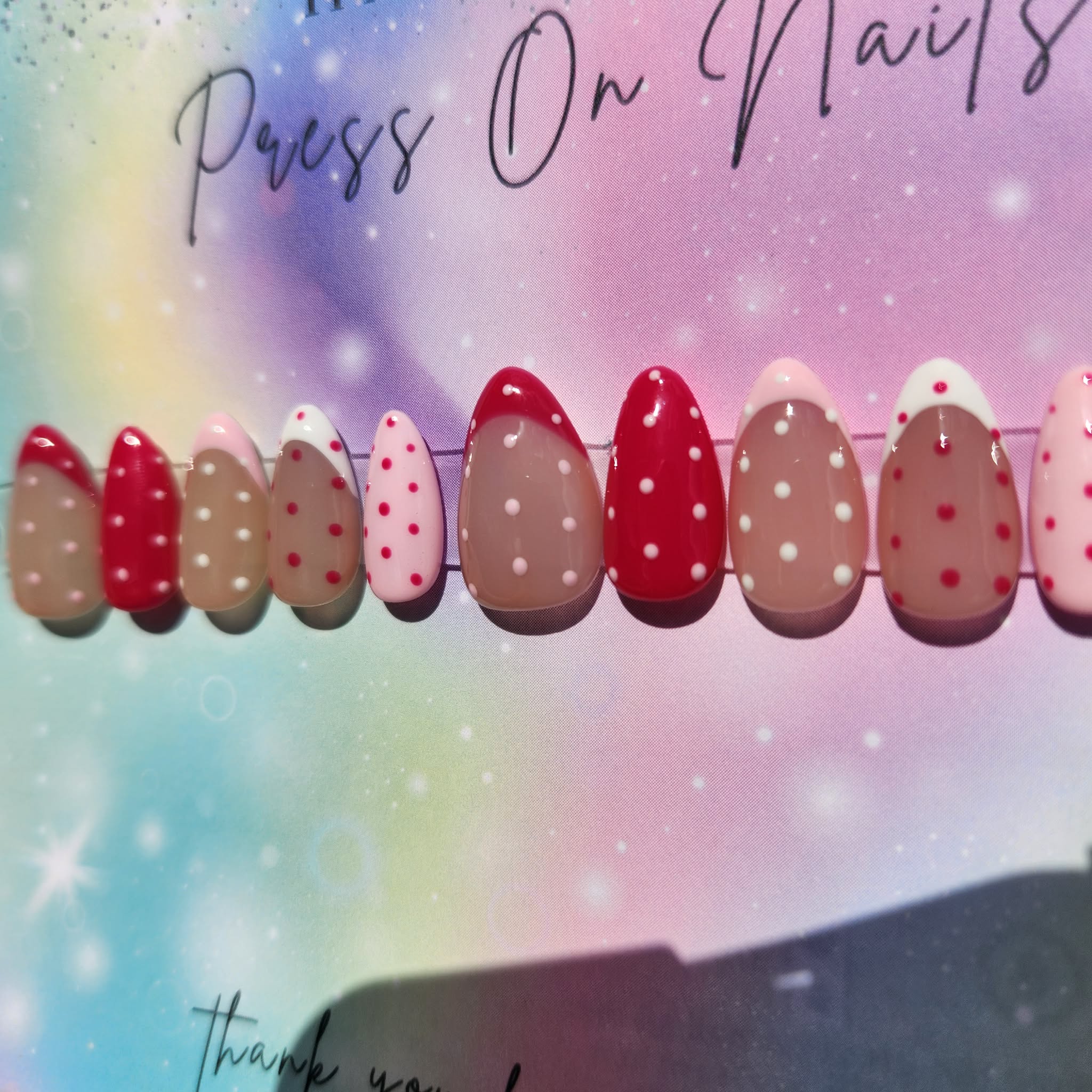 almond shape light dark pink polka dot French tip press ons