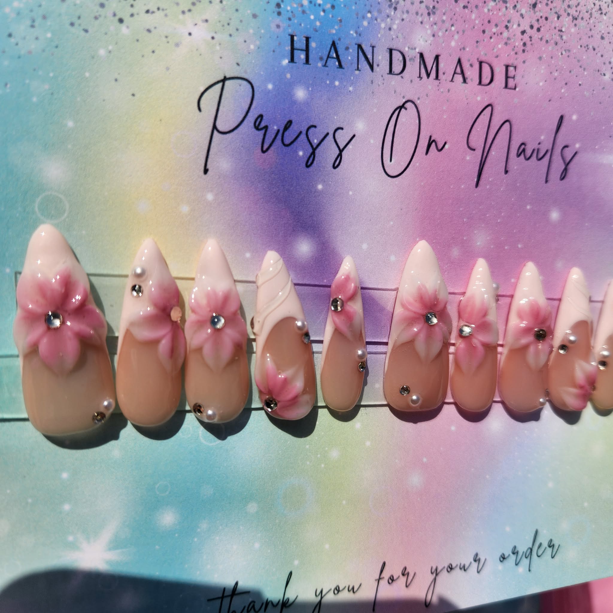 long stiletto almond shape light pink French tip pink 3d floral rhinestone press ons