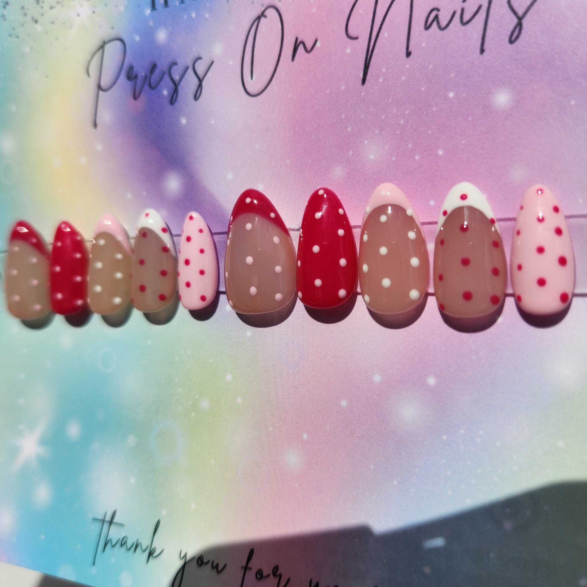 almond shape light dark pink polka dot French tip press ons