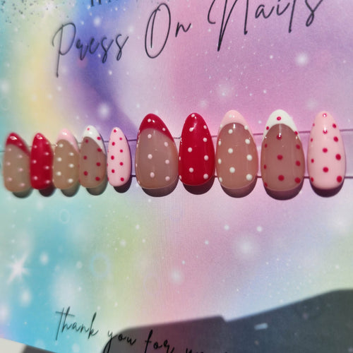 almond shape light dark pink polka dot French tip press ons